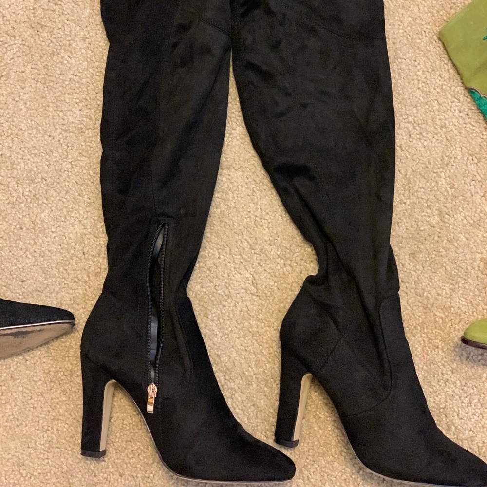 Black over the knee boots.
